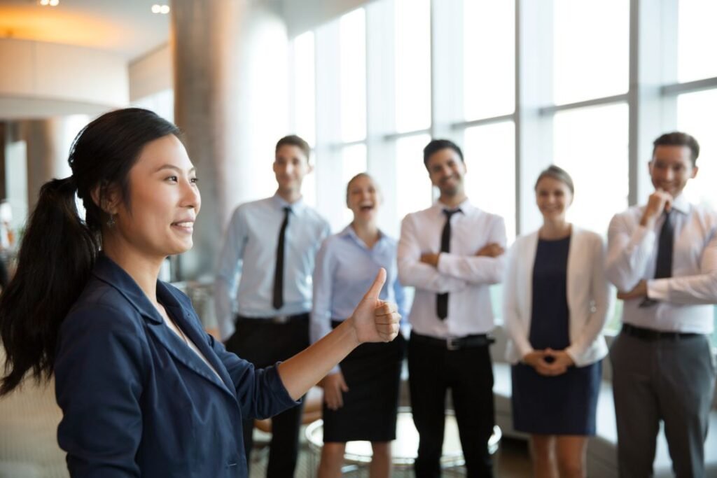 a strong female leader talking, showing leadership presence