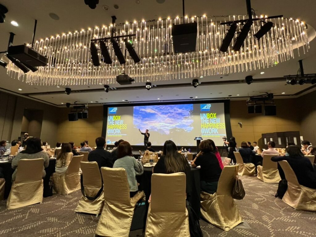 Joseph Wong speaking on stage